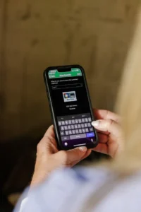 Homeowner setting up an outdoor system controller in a smartphone app